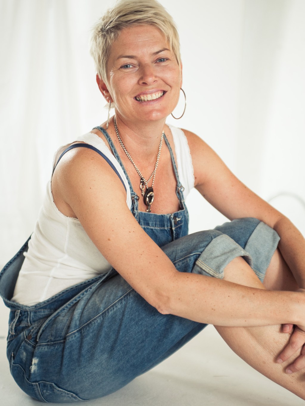 Usminka og uretusjert